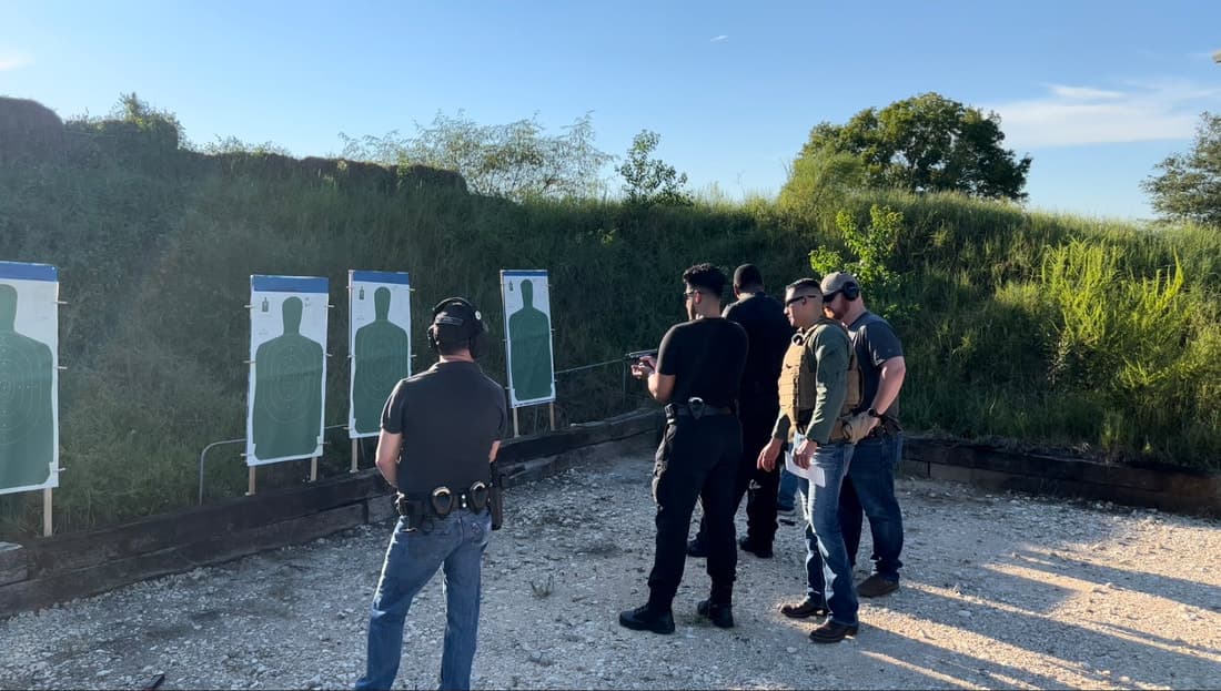 Students receiving firearms training on the range